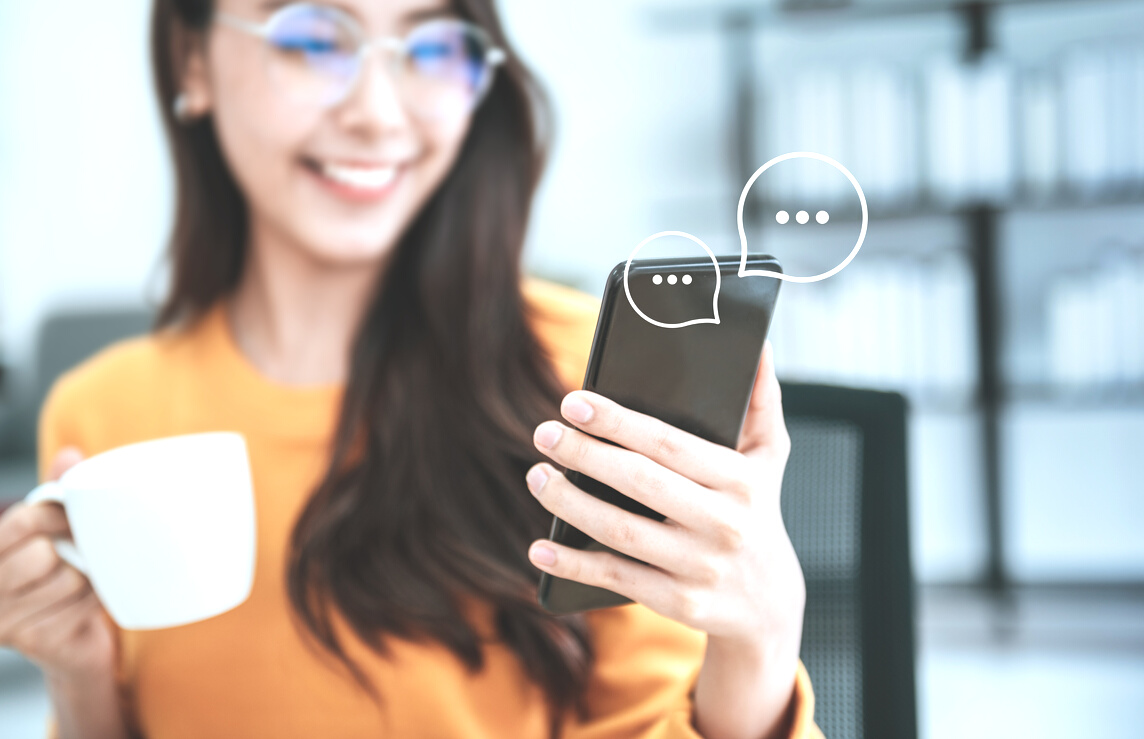 Women's hand typing on mobile smartphone, Live Chat Chatting on application Communication Digital Web and social network Concept